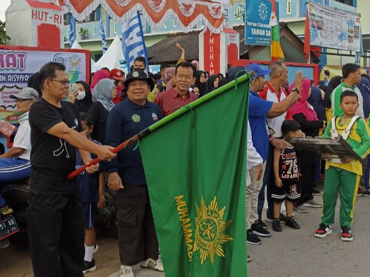 Maryani Raih Sepeda Listrik Jalan Sehat Gebyar Muktamar Muhammadiyah 3 IMG 20221022 154647